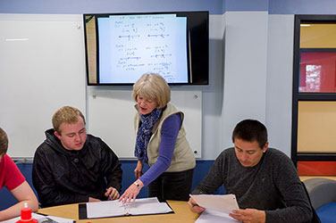 Instructor and students in a classroom