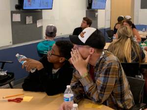 Students listening to instructor