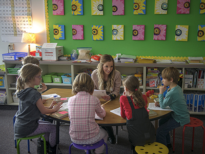 Teacher with students