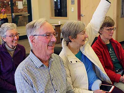 Four OLLI students at an event