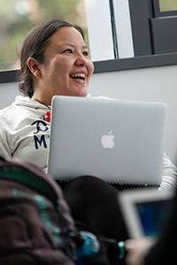 Native American woman with a laptop computer